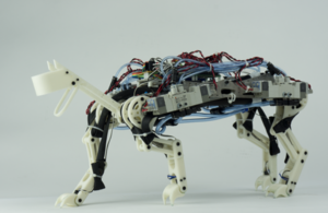 Development of a Minimalistic Pneumatic Quadruped Robot for Fast Locomotion